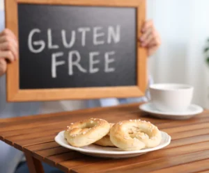 Man Holding Small Chalkboard With Text Gluten Free 2026 01 11 10 51 42 Utc